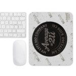 Computer mousepad with black circular logo