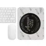 Computer mousepad with black circular logo