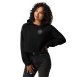 Smiling woman wearing black cropped hoodie